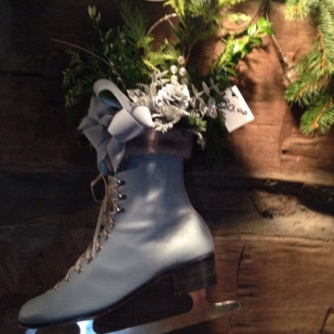 fresh pine arrangement in white ice skate