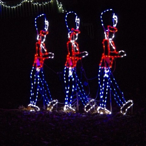 three lit soldiers on display