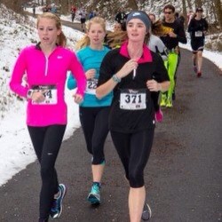 3 women running during winter