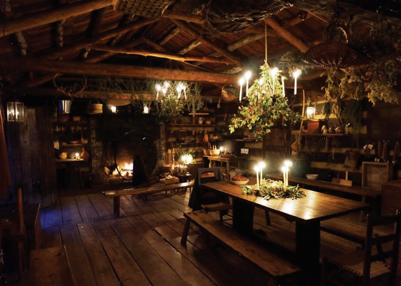 lit candles decorating the inside of Pricketts fort