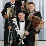four members of a family polka band holding accordions