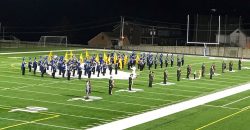 high school marching band on field