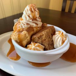Pumpkin Gingerbread Sundae with Warm Home Made Gingerbread , Pumpkin Ice Cream topped with Hot Caramel, Whipped Cream and a 