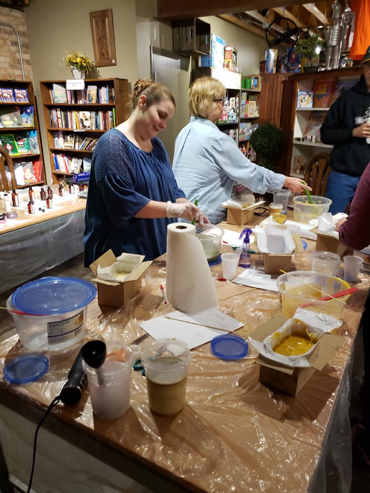 People making handmade soap