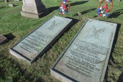 grave markers on the ground