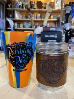 Image of a colorful cut and Mason jar covered with a leather sleeve