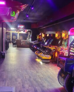 interior shot of an arcade and axe throwing venue