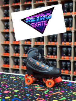 a black roller skate sitting on a counter with a shelf of skates in the background