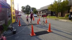 Photo of woman and child finishing a race.